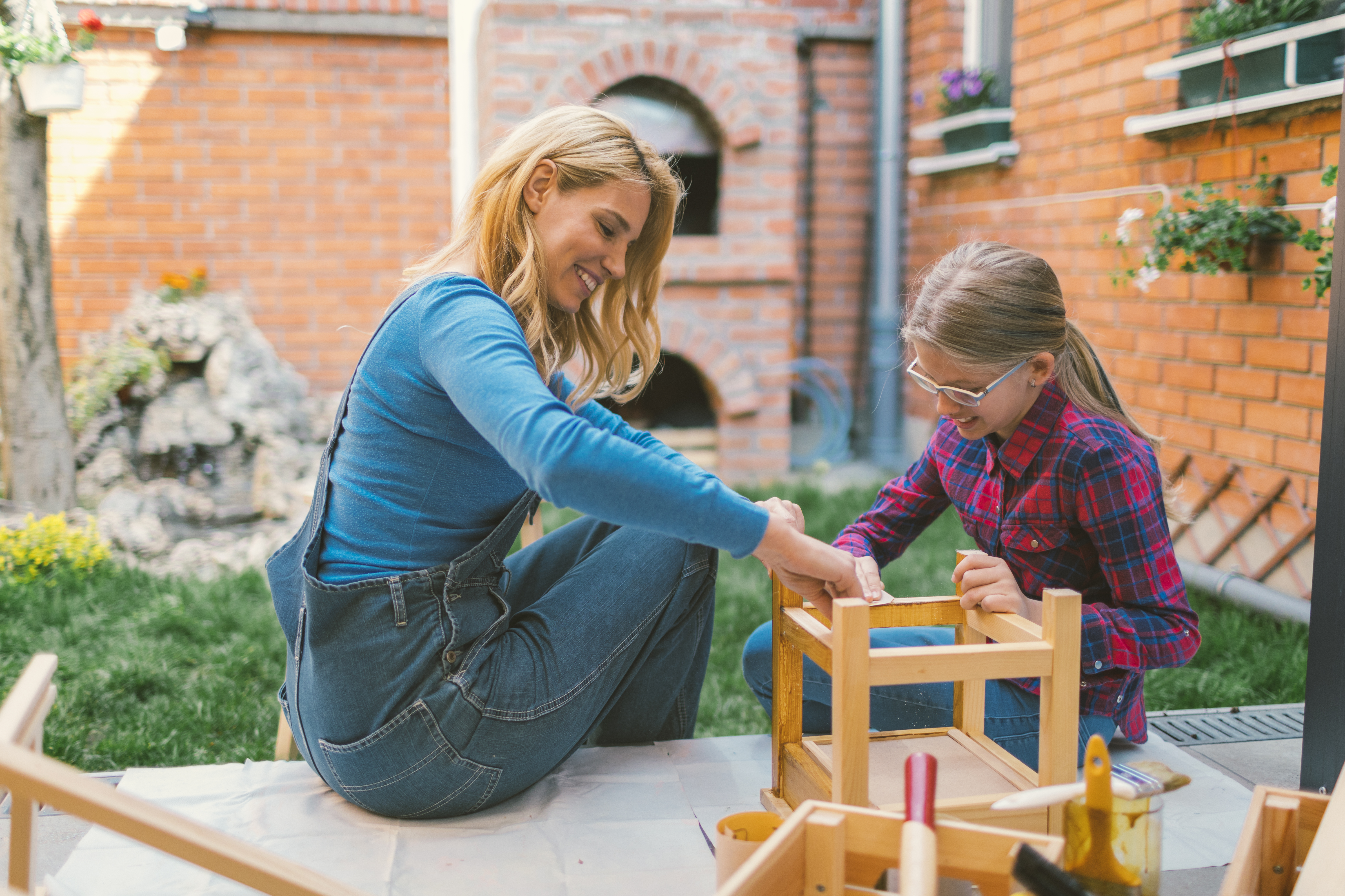 Mother And Daughter repairing furniture