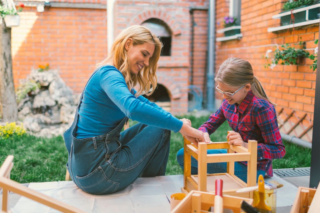 Mother And Daughter repairing furniture