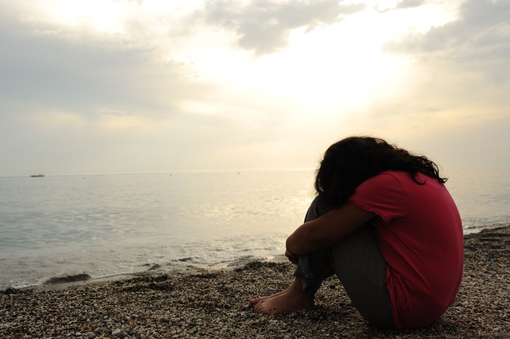 Sad Woman at the Beach