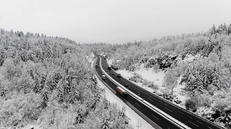 Snowy Highway in January with Scenic Winter Forest